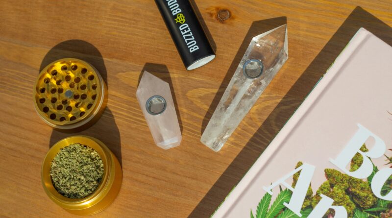 Smoke shop accessories including glassware, grinders, cigar tools, storage products and maintenance gear